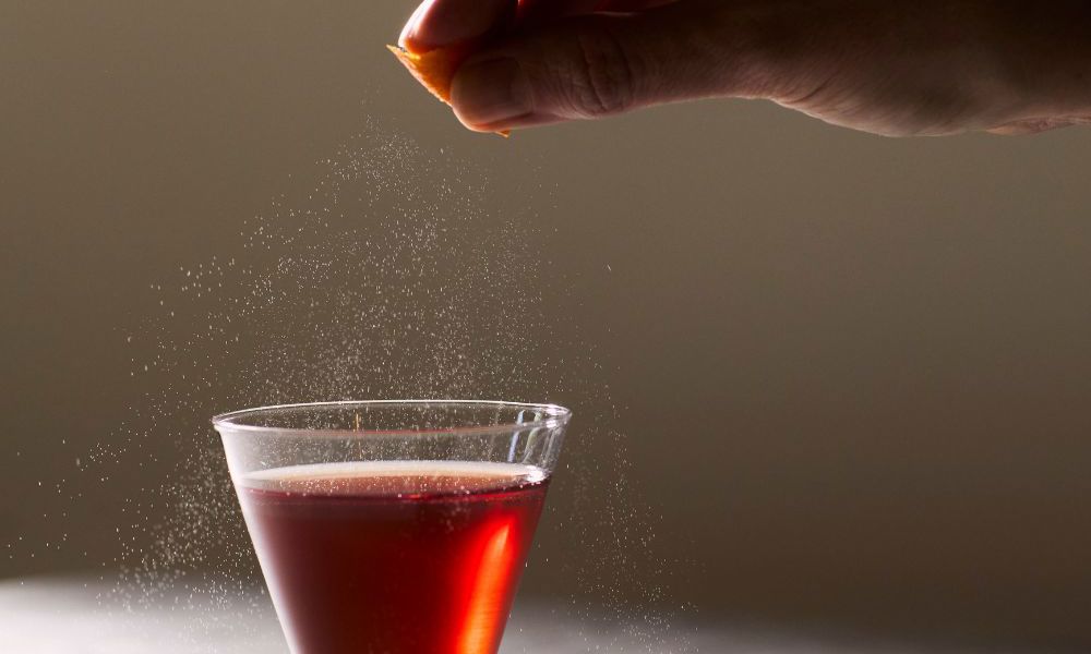 Emberwood garnishing a cocktail