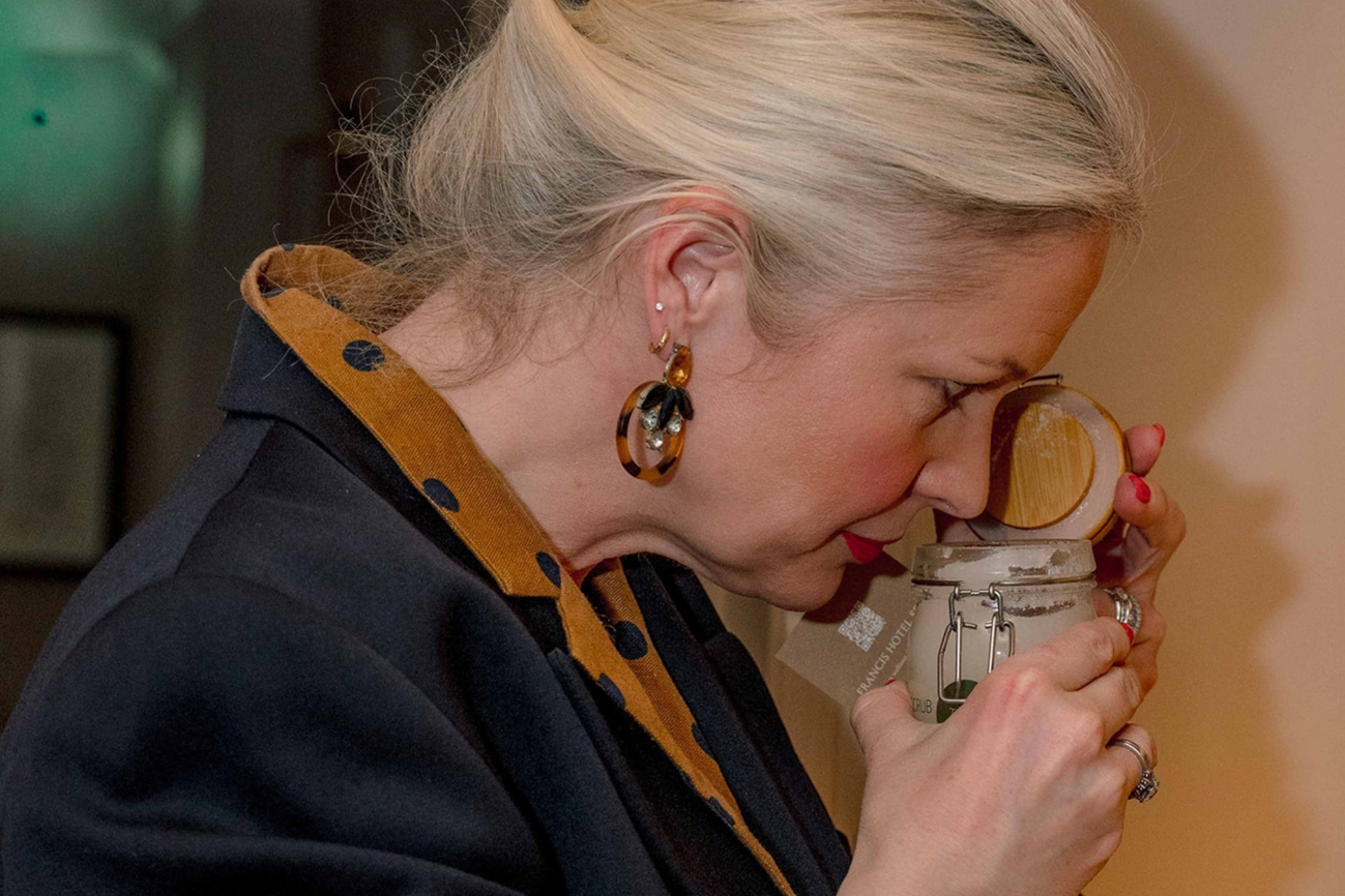 Interior designer smelling GAIA Skincare
